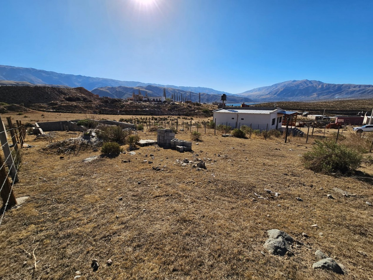 VENTA LOTE 655M2 EL MOLLAR BARRIO CERRADO, LUZ, AGUA, VISTA MAS BASE DE MATERIAL DE 130M2