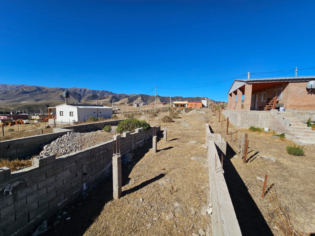 VENTA LOTE 655M2 EL MOLLAR BARRIO CERRADO, LUZ, AGUA, VISTA MAS BASE DE MATERIAL DE 130M2